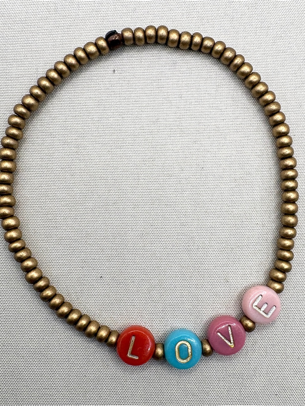 Gold Bead Bracelet with Pink, Red & Blue 'LOVE' Letter Beads